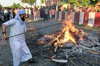 Police Manhunt After Cleric's Grave Desecra