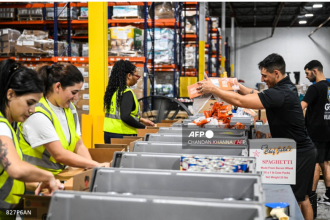 Volunteers assemble relief packages for Hurricane Melissa at the Global Empowerment Mission headquarters in Miami, Florida, on October 27, 2024.